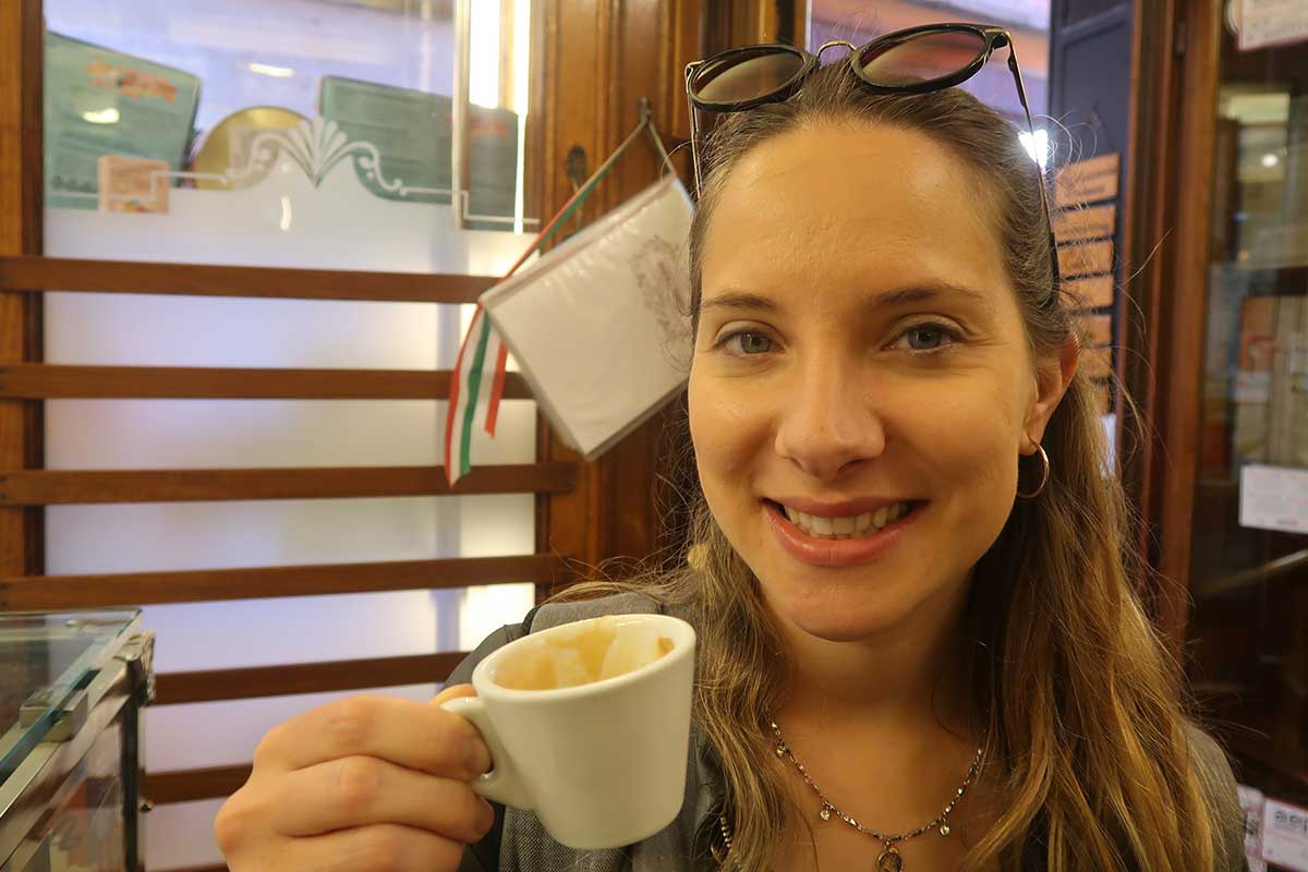 maddy drinking coffee in venice