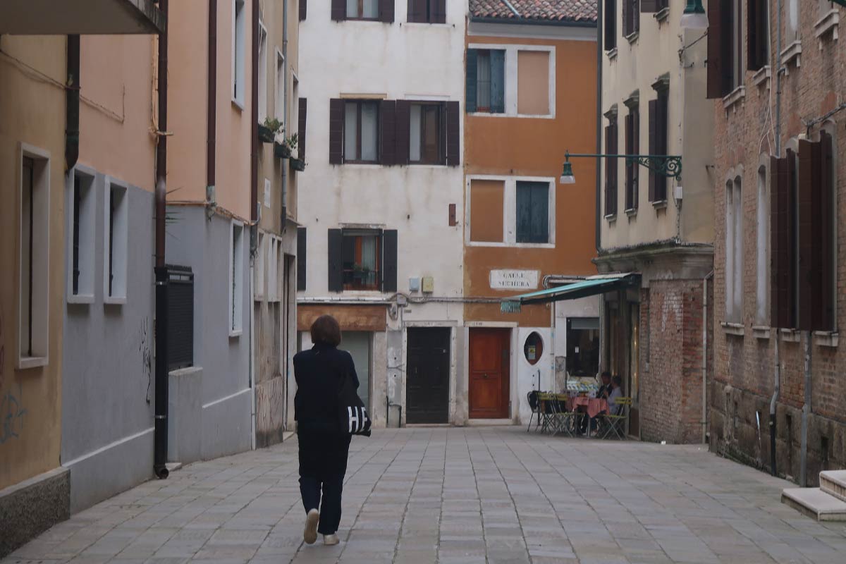 local person walking the streets of venice